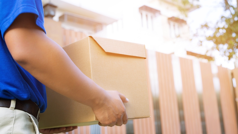a man delivery an item to customer